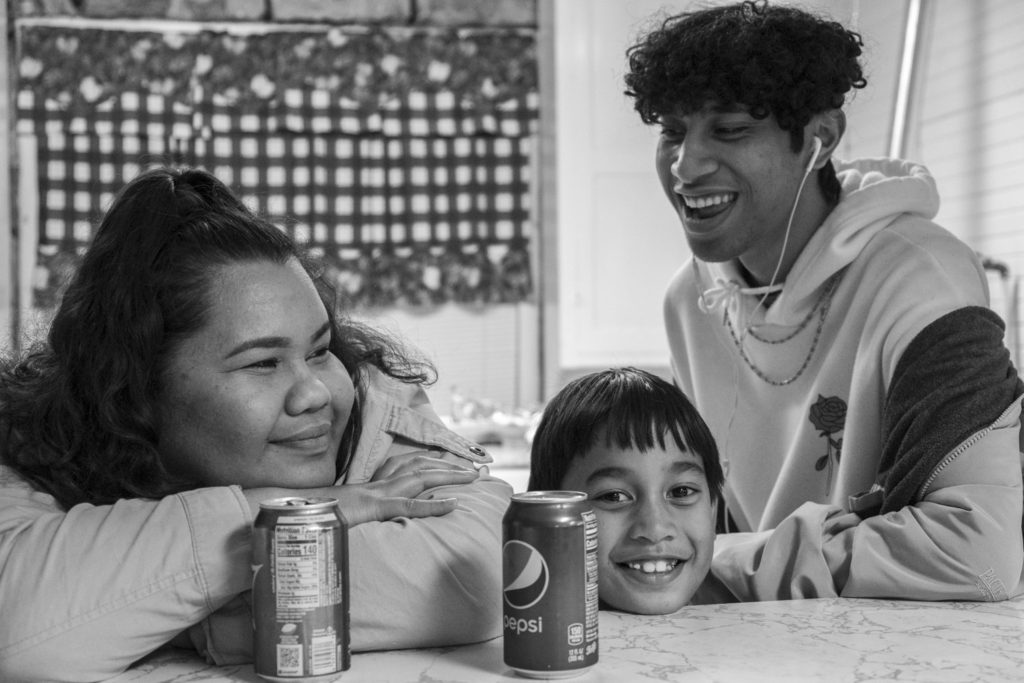 Marshallese Young People Gather in the Kitchen, Nuclear Remembrance Day, Springdale, Arkansas