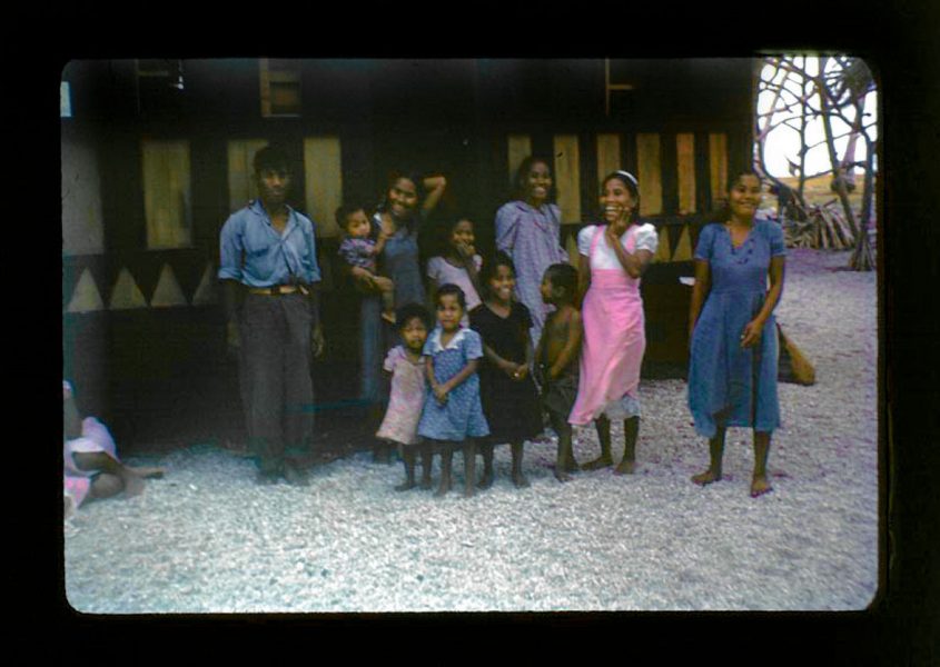 Mason, Leonard, 00.0027-K “Group of ex-Bikinians in front of Rongerik house.,”
